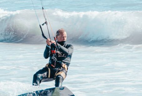 Calls-to-Action - A man kite surfing in the ocean