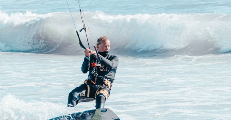 Calls-to-Action - A man kite surfing in the ocean