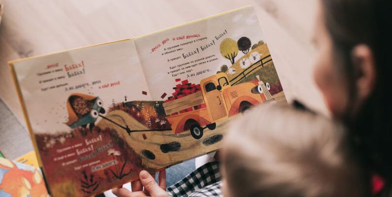 Storytelling - Woman Reading Book to Toddler